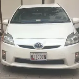 First Car Bought With Bitcoin token logo